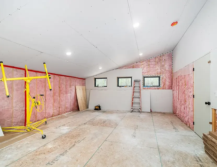 drywall work on room with slanted ceiling