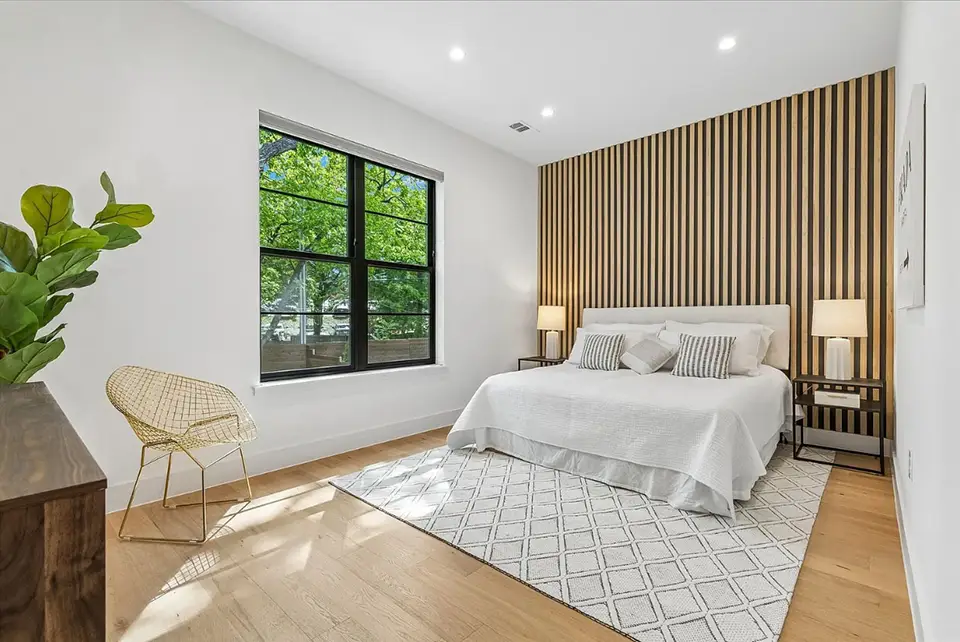 bedroom view with large window