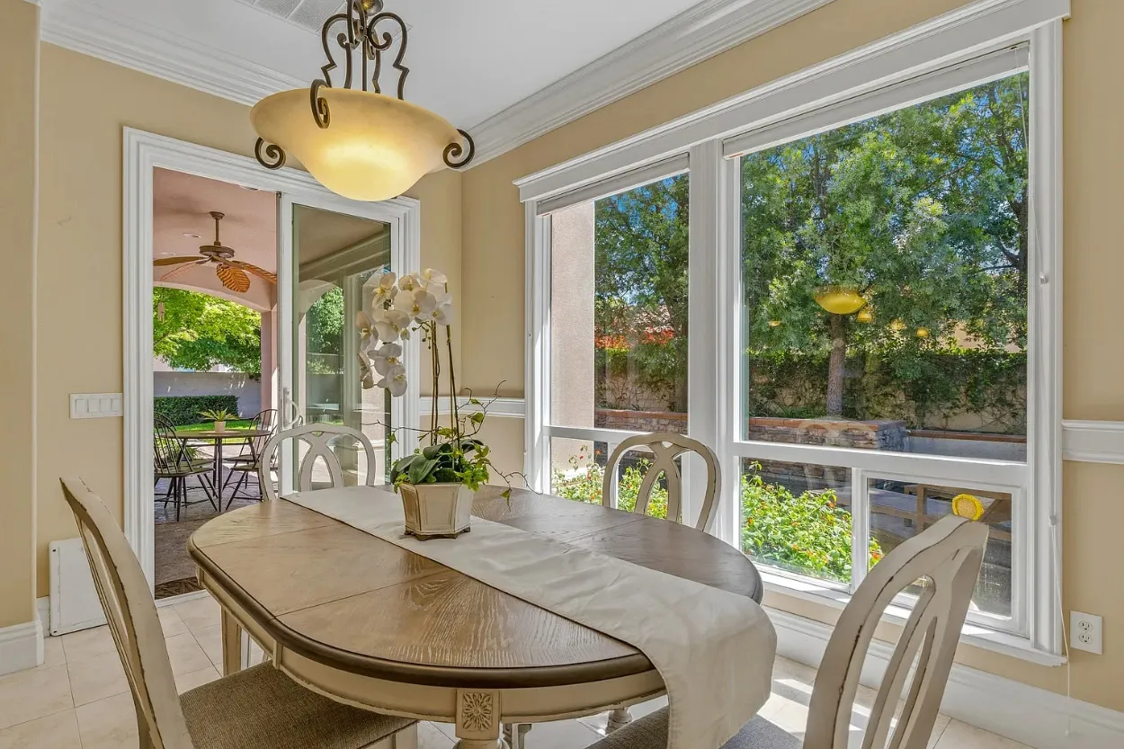 dining area with feature windows